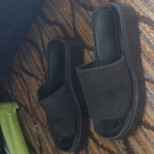 Womens black knit platform sandals.